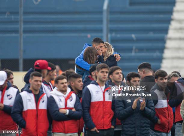 Uruguayan football player Luis Suarez greets his fans accompanied by his wife Sofia Balbi and their children during his unveiling as the new player...