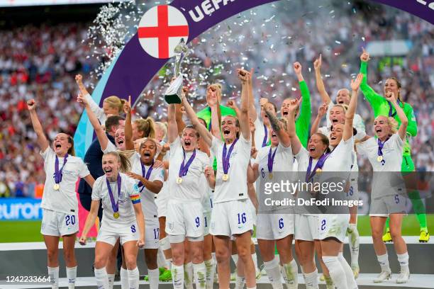 The players of England celebrate with the trophy after the UEFA Women's Euro England 2022 final match between England and Germany at Wembley Stadium...
