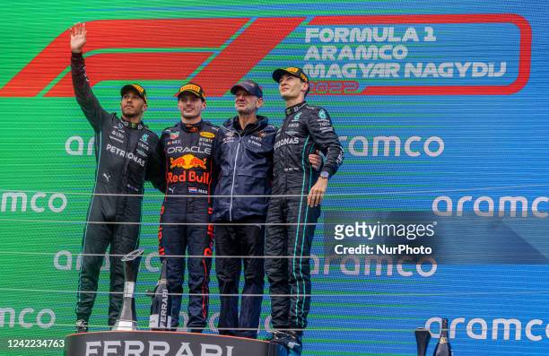1st Max Verstappen, 2nd Lewis Hamilton and 3rd George Russel on the podium aftre the race at Hungarian Aramco Formula 1 Grand Prix on July 31, 2022...