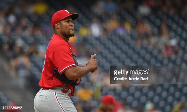 Jeurys Familia of the Philadelphia Phillies reacts after giving up a RBI single to Yoshi Tsutsugo of the Pittsburgh Pirates in the ninth inning...