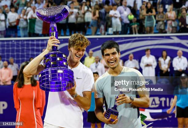 Jannik Sinner of Italy and Carlos Alcaraz of Spain pose with the trophies after the men's singles final match on Day 8 of the 2022 Croatia Open Umag...