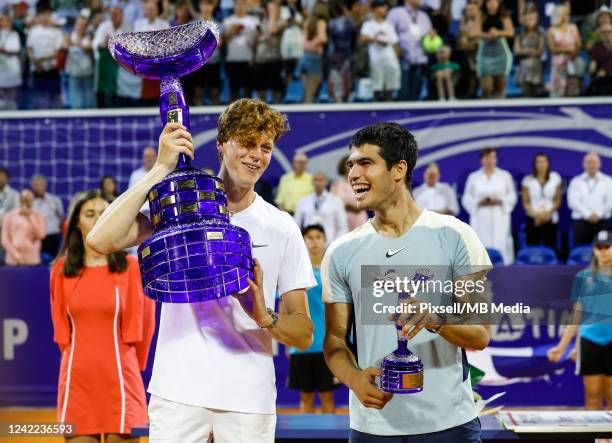 Jannik Sinner of Italy and Carlos Alcaraz of Spain pose with the trophies after the men's singles final match on Day 8 of the 2022 Croatia Open Umag...