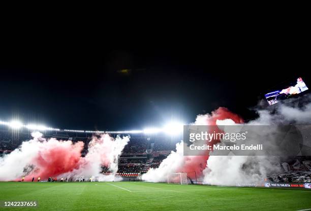 Fans of River Plate cheer for their team before a match between River Plate and Sarmiento as part of Liga Profesional 2022 at Estadio Monumental...
