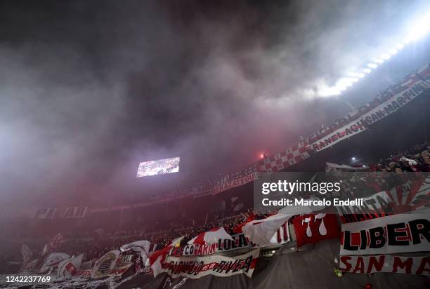 Fans of River Plate cheer for their team before a match between River Plate and Sarmiento as part of Liga Profesional 2022 at Estadio Monumental...