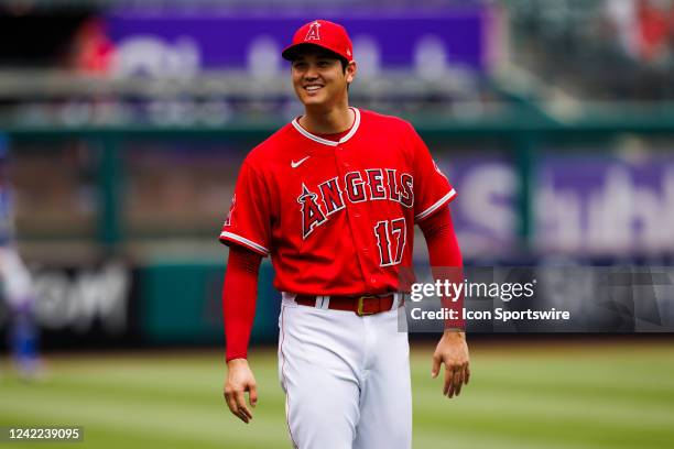 Los Angeles Angels starting pitcher Shohei Ohtani smiles during the MLB regular season game against the Texas Rangers on July 31, 2022 at Angel...