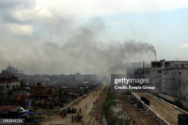 View of the industrial zone and air pollution around a re-rolling mill in Dhaka. Increased pollution in Bangladesh is an issue that worries...