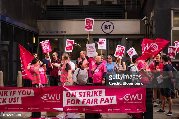 Employees of BT Group Plc, unionized with the Communication Workers Union, stand on a picket line at the BT Tower during a strike in London, UK, on...