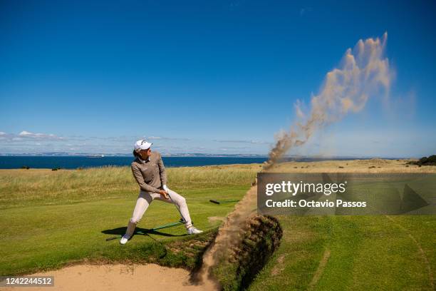 Johanna Gustavsson of Sweden plays a bunker shot on the 5th hole during a practice round prior to the AIG Women's Open at Muirfield on August 1, 2022...