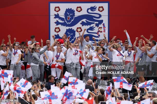 England's players celebrate during a victory party in Trafalgar Square in central London on August 1 a day after England beat Germany 2-1 to win the...