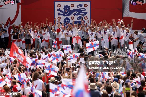 England's players celebrate during a victory party in Trafalgar Square in central London on August 1 a day after they beat Germany 2-1 to win the...