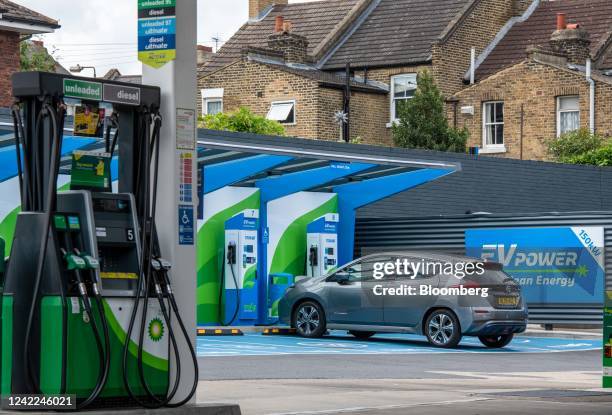 Plc petrol station forecourt with fuel pumps and plug-in electric vehicle charging points in London, UK, on Monday, Aug. 1, 2022. BP will report...