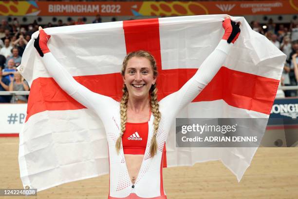 Gold medallist England's Laura Kenny celebrates winning the women's 10km scratch race cycling event on day four of the Commonwealth Games, at the Lee...