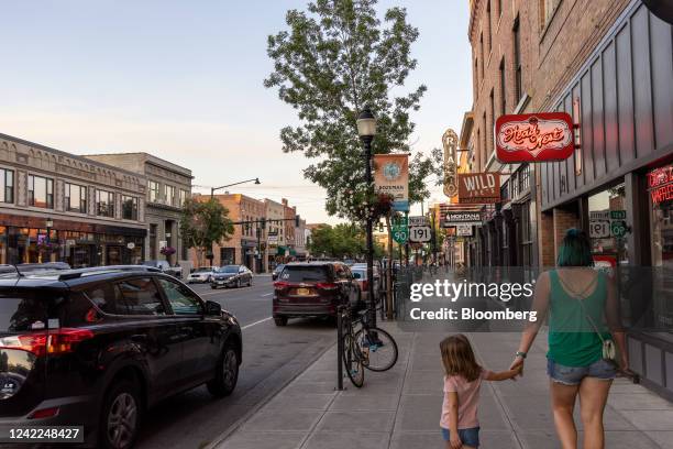 Pedestrians walk along Main Street in Bozeman, Montana, US, on Tuesday, July 19, 2022. Across Montana's 147,000 square miles, the state government...