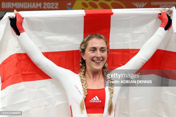 Gold medallist England's Laura Kenny celebrates winning in the women's 10km scratch race cycling event on day four of the Commonwealth Games, at the...