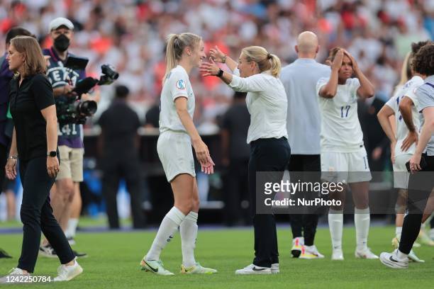 Sarina Wiegman, England head coach, embraces Leah Williamson of England at the final whistle of the UEFA Women's European Championship match between...