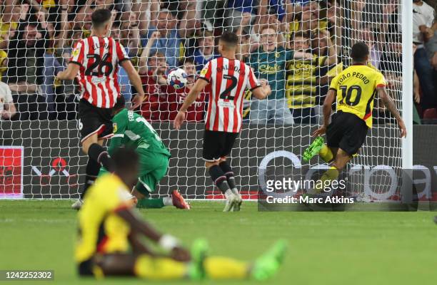 Joao Pedro of Watford scores the winning goal during the Sky Bet Championship between Watford and Sheffield United at Vicarage Road on August 1, 2022...