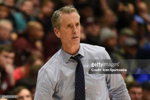 Penn Quakers head coach Steve Donahue observes the action during a college basketball game between the Penn Quakers and the Harvard Crimson on...