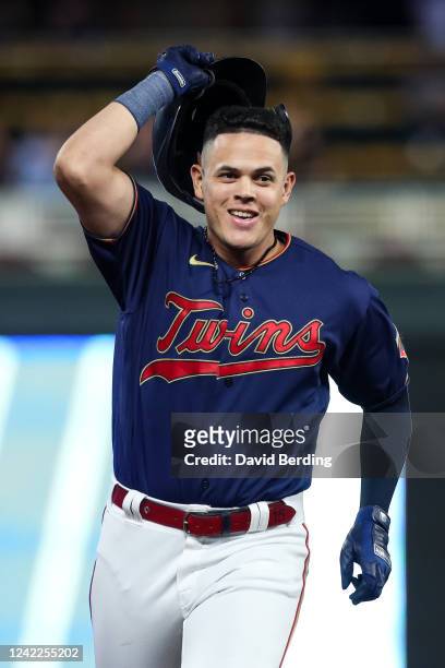 Gio Urshela of the Minnesota Twins celebrates his first career walk-off two-run home run as he rounds the bases against the Detroit Tigers in the...