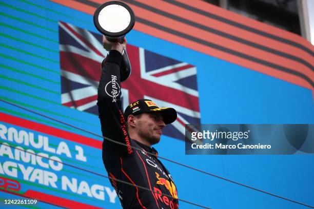 Max Verstappen of Red Bull Racing celebrates on the podium at the end of the F1 Grand Prix of Hungary. .