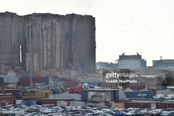 Helicopter drops water over the devastated Beirut port wheat silos after part of it collapsed just five days before the 2nd anniversary of the 4th of...