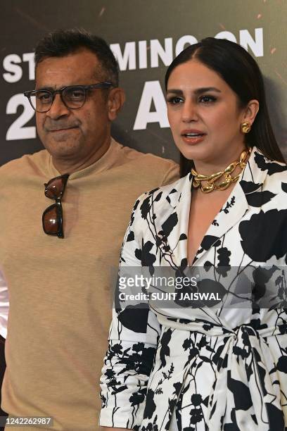 Bollywood film director Subhash Kapoor and actress Huma Qureshi pose for pictures during the promotion of their television Hindi web series Maharani...