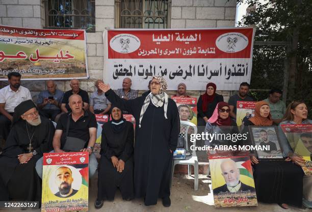 Parish priest of the Melkite Greek Catholic church in Ramallah Archimandrite Abdullah Yulio takes part in a demonstration in support of Palestinian...