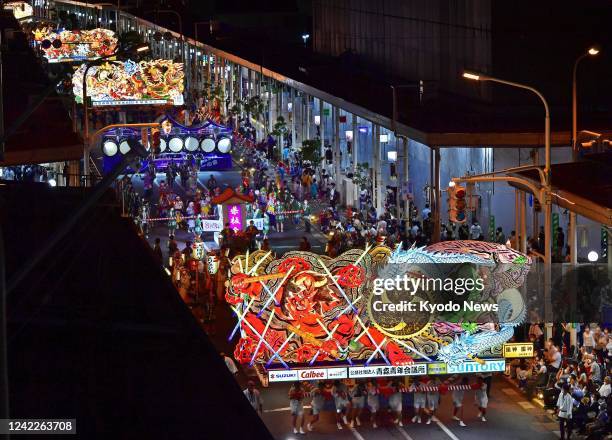 The Nebuta summer festival, famous for its nightly parades of illuminated giant paper-made lanterns, begins in the northeastern Japan city of Aomori...