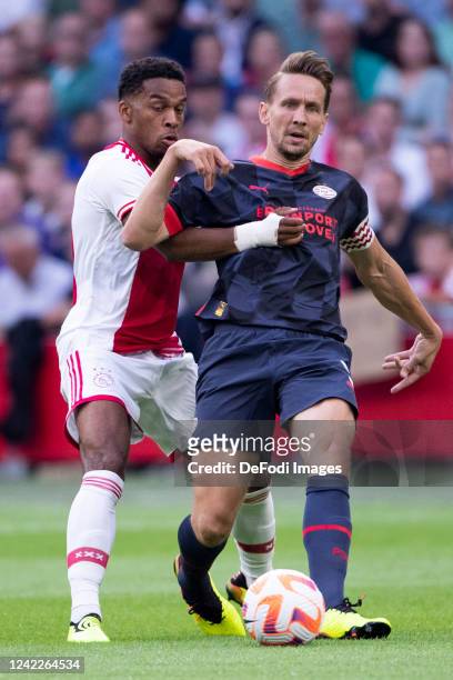 Luuk de Jong of PSV Eindhoven and Jurrien Timber of Ajax Amsterdam Battle for the ball during the Johan Cruijff Cup match between Ajax and PSV at...