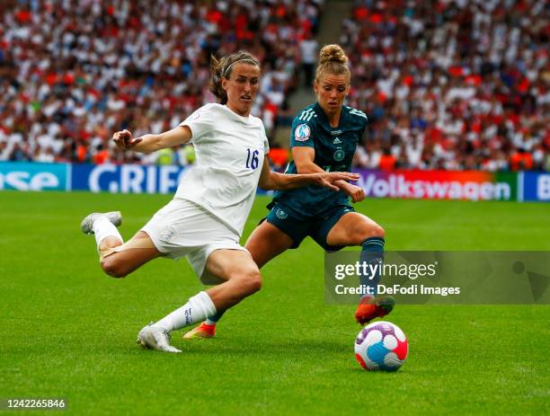 Jill Scott of England and Linda Dallmann of Germany battle for the ball during the UEFA Women's Euro England 2022 final match between England and...