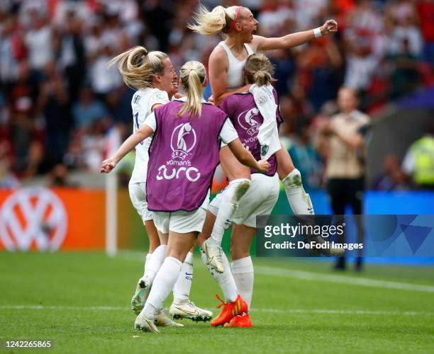 Chloe Kelly of England Celebrates winning the tournament with her team during the UEFA Women's Euro England 2022 final match between England and...