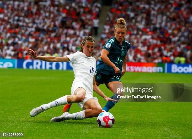 Jill Scott of England and Linda Dallmann of Germany battle for the ball during the UEFA Women's Euro England 2022 final match between England and...