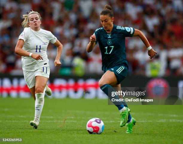 Lauren Hemp of England and Felicitas Rauch of Germany battle for the ball during the UEFA Women's Euro England 2022 final match between England and...