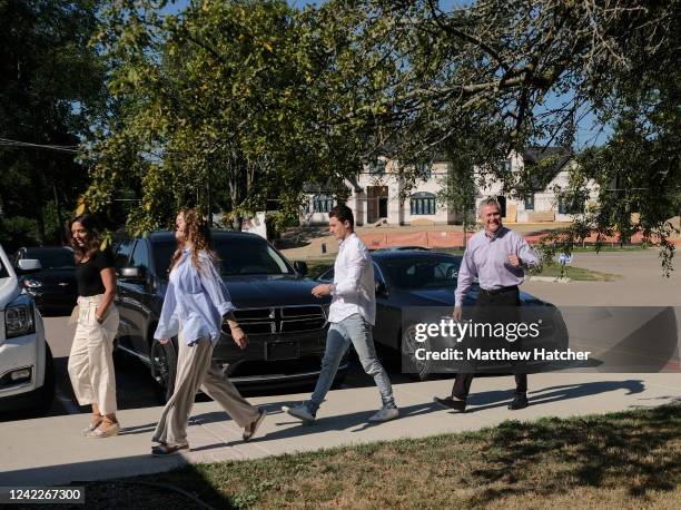 Michigan Gubernatorial Republican candidate Kevin Rinke arrives with his family at a polling station during the Michigan Primary Election on August...