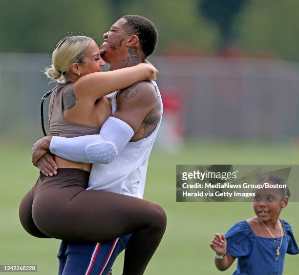 August 2: New England Patriots Kendrick Bourne gets a hug from his girlfriend during training camp at Gillette Stadium on August 2, 2022 in Foxboro,...