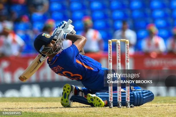 Suryakumar Yadav, of India, hits 4 during the third T20I match between West Indies and India at Warner Park in Basseterre, Saint Kitts and Nevis, on...