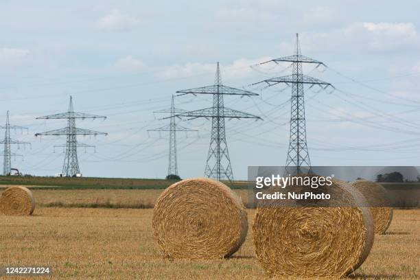Genergal view o Round bales of straw on the feld at Neurath in Grevenbroich, Germany on August 2, 2022 as Germany plan to reactivate coal power...