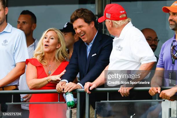 Former President Donald Trump, Tucker Carlson and Marjorie Taylor Greene during the 3rd round of the LIV Golf Invitational Series Bedminster on July...