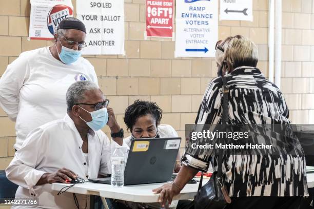 Michigan residents their ballots in the Michigan primary election on August 2, 2022 in Bloomfield Hills, Michigan. Among those running in this...