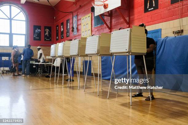 Michigan residents their ballots in the Michigan primary election on August 2, 2022 in Bloomfield Hills, Michigan. Among those running in this...