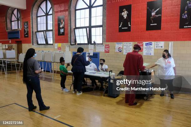 Michigan residents their ballots in the Michigan primary election on August 2, 2022 in Bloomfield Hills, Michigan. Among those running in this...