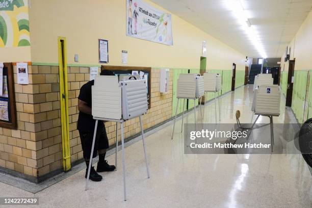 Michigan residents their ballots in the Michigan primary election on August 2, 2022 in Bloomfield Hills, Michigan. Among those running in this...