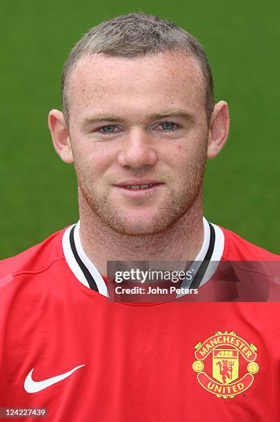 Wayne Rooney of Manchester United poses at the annual club photocall at Old Trafford on September 9, 2011 in Manchester, England.