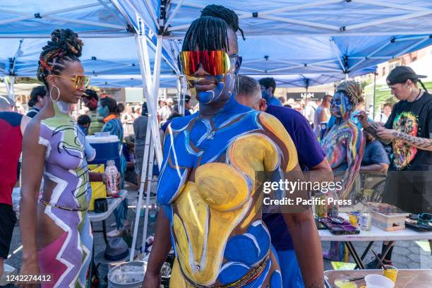 Model painted by an artist participated in 9th annual NYC Bodypainting Day with the theme for 2022 is Hope at Union Square. The annual event is...