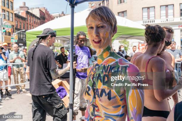 Model painted by an artist participated in 9th annual NYC Bodypainting Day with the theme for 2022 is Hope at Union Square. The annual event is...