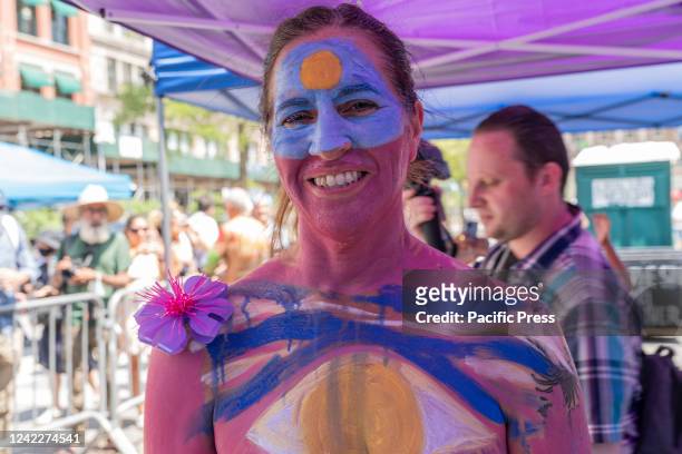 Model painted by an artist participated in 9th annual NYC Bodypainting Day with the theme for 2022 is Hope at Union Square. The annual event is...
