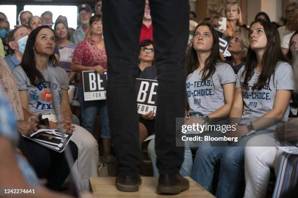 Attendees listen while Beto O'Rourke, Democratic gubernatorial candidate for Texas, speaks during a campaign event at the Galveston Railroad Museum...