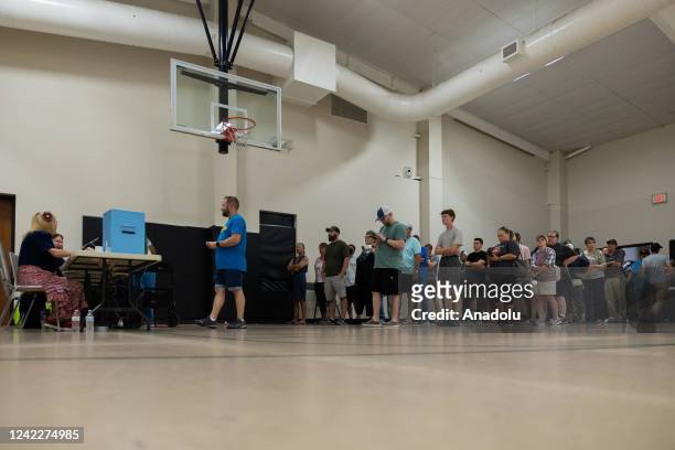 Voters wait in line at the Westlink Church of Christ Eve in Wichita, Kansas on Tuesday August 2nd, 2022 as voters decide on a constitutional...