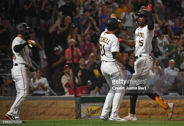 Oneil Cruz of the Pittsburgh Pirates celebrates with Cal Mitchell after hitting a three run home run in the sixth inning during the game against the...