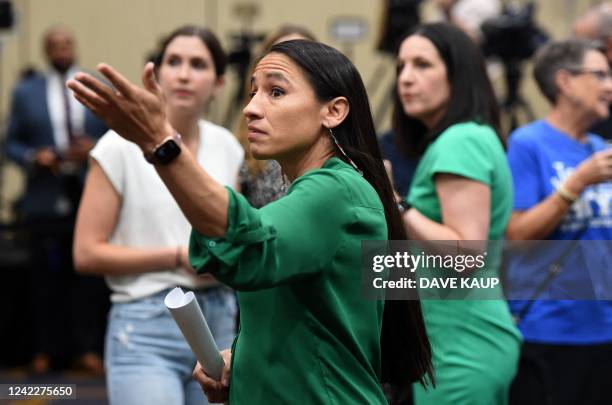 Representative Sharice Davids gestures to a television screen during the pro-choice Kansas for Constitutional Freedom primary election watch party in...