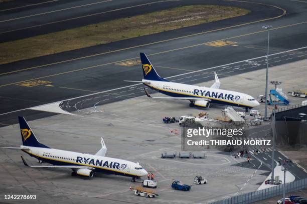 This aerial view taken on July 29, 2022 shows Ryanair aircrafts on the tarmac at Bordeaux-Merignac Airport in Merignac, southwest France.
